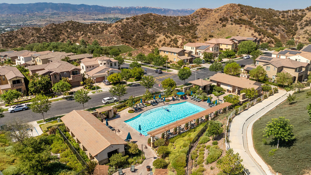 Comprehensive guide for buying a home in Valencia, CA, covering neighborhoods, schools, HOAs, and market tips.