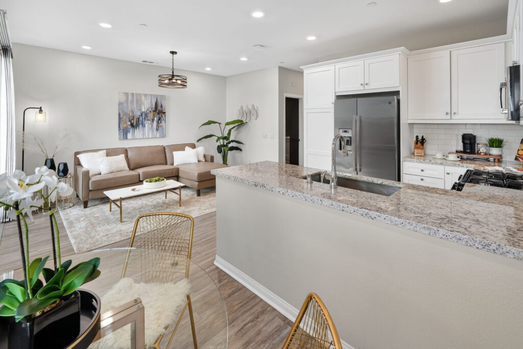 The dining room of a bright and open floorplan home in River Village Santa Clarita