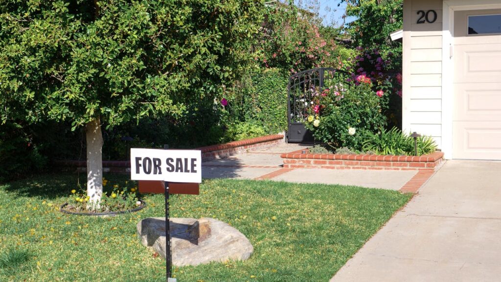 For sale sign on front porch of a Santa Clarita Valley home